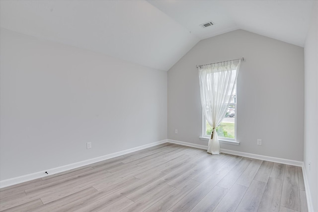4932 Fairmont Dr, Graniteville, SC 29829 - interior space featuring baseboards, visible vents, lofted ceiling, and light wood-style floors