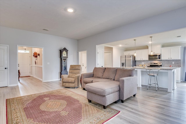 4932 Fairmont Dr, Graniteville, SC 29829 - living area featuring baseboards, recessed lighting, light wood-style flooring, and visible vents