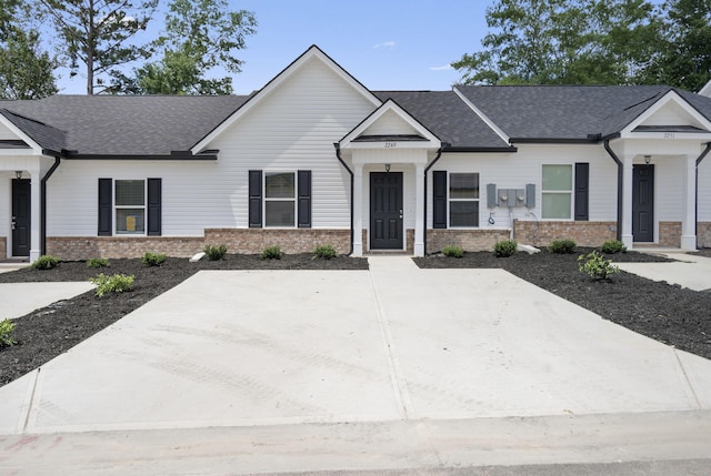 2247 Archer Ln, Augusta, GA 30906 - modern inspired farmhouse with roof with shingles and brick siding
