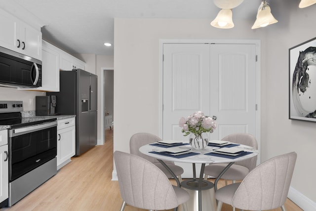 2247 Archer Ln, Augusta, GA 30906 - dining space with light wood-style flooring and recessed lighting