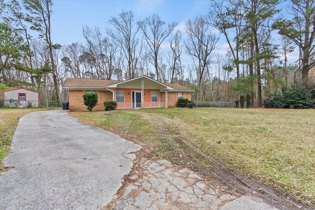 3639 Massoit Dr, Augusta, GA 30906 - view of front of house featuring brick siding and asphalt driveway