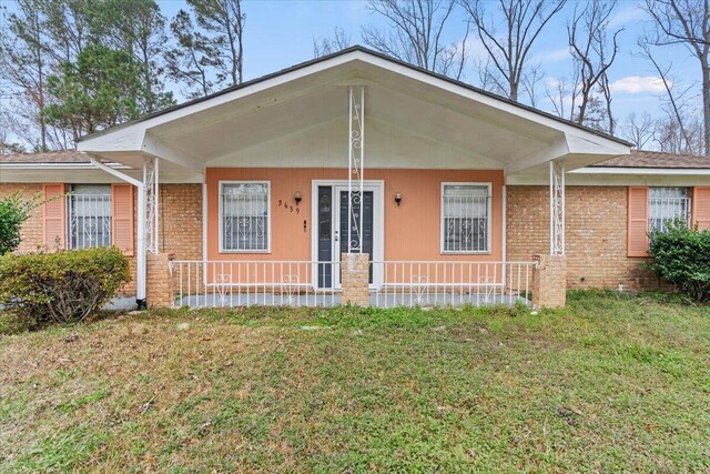 3639 Massoit Dr, Augusta, GA 30906 - view of front of home featuring a front lawn and brick siding