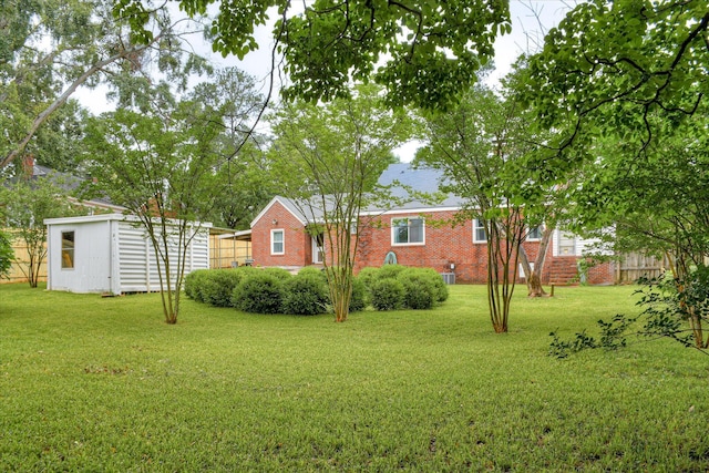 2336 Redwood Dr, Augusta, GA 30904 - view of green lawn with an outdoor structure