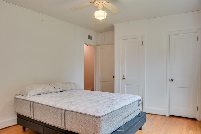 2336 Redwood Dr, Augusta, GA 30904 - bedroom with light wood finished floors and ceiling fan