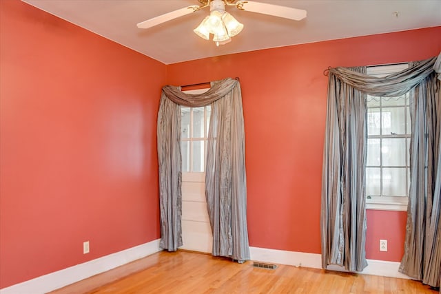 2336 Redwood Dr, Augusta, GA 30904 - spare room with a ceiling fan, light wood-type flooring, and baseboards