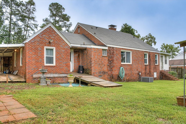 2336 Redwood Dr, Augusta, GA 30904 - back of house with brick siding, a yard, a chimney, and crawl space