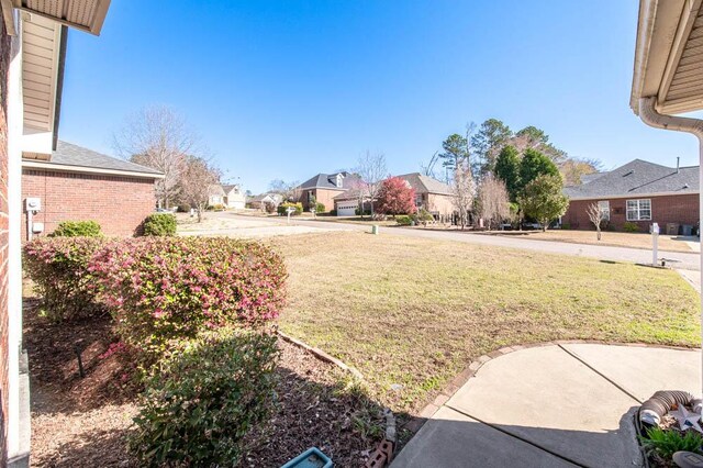 view of yard featuring a residential view