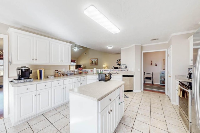 kitchen featuring visible vents, stainless steel appliances, light countertops, light tile patterned floors, and ceiling fan