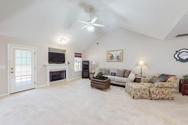 living room with visible vents, carpet floors, and a fireplace