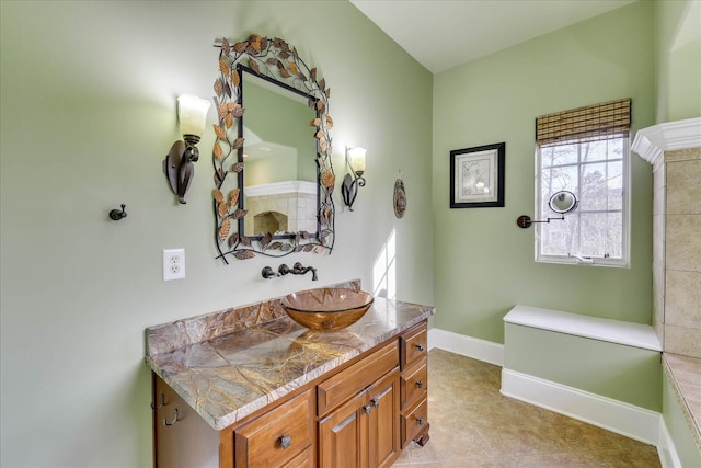 bathroom featuring tile patterned floors and vanity