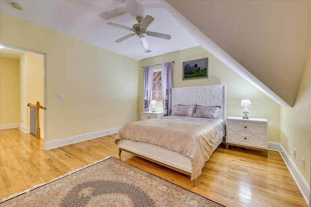 bedroom featuring ceiling fan and light hardwood / wood-style flooring