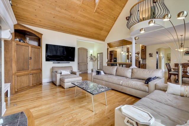 living room with high vaulted ceiling, wooden ceiling, a notable chandelier, and light hardwood / wood-style floors