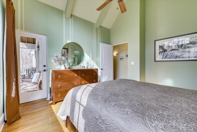 bedroom featuring high vaulted ceiling, light hardwood / wood-style floors, beam ceiling, and ceiling fan