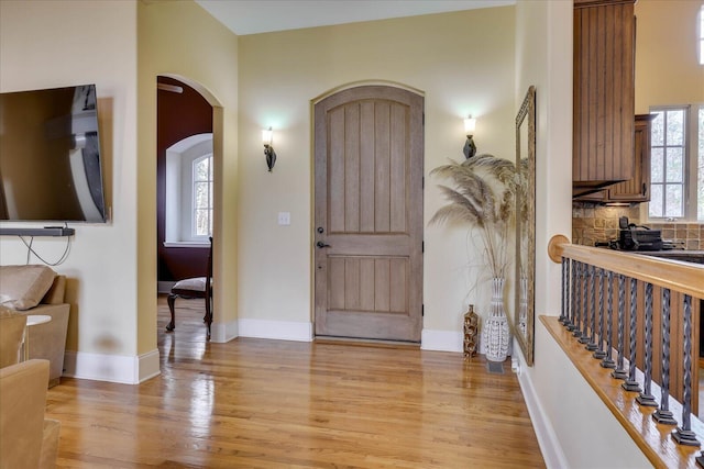 entryway with light hardwood / wood-style flooring