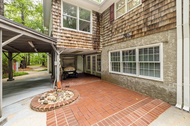 view of patio / terrace with a carport