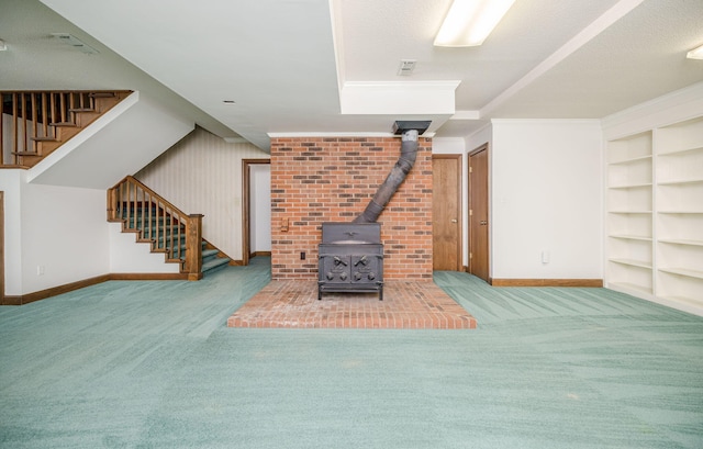 unfurnished living room featuring carpet floors and a textured ceiling