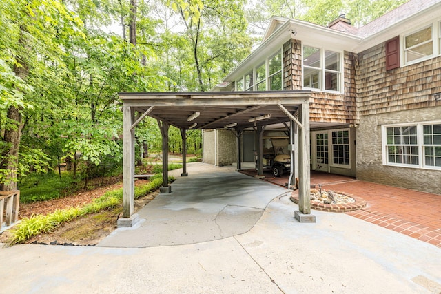 view of car parking featuring a carport