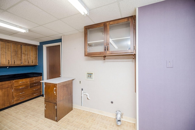 clothes washing area with hookup for a washing machine and hookup for an electric dryer