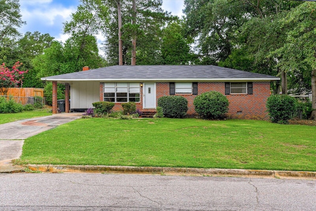 ranch-style house featuring a front lawn