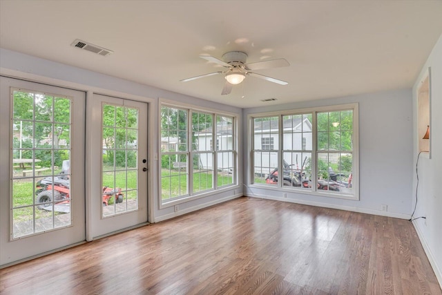 interior space featuring ceiling fan