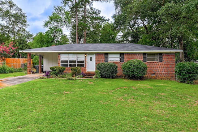 single story home featuring a carport and a front yard