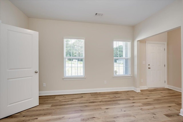 4921 Mossycup Ct, Hephzibah, GA 30815 - entrance foyer featuring wood finished floors and healthy amount of natural light