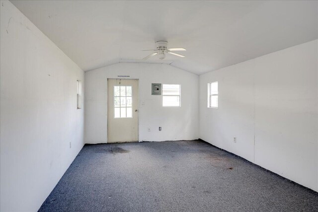 4921 Mossycup Ct, Hephzibah, GA 30815 - spare room with carpet floors, ceiling fan, vaulted ceiling, and electric panel