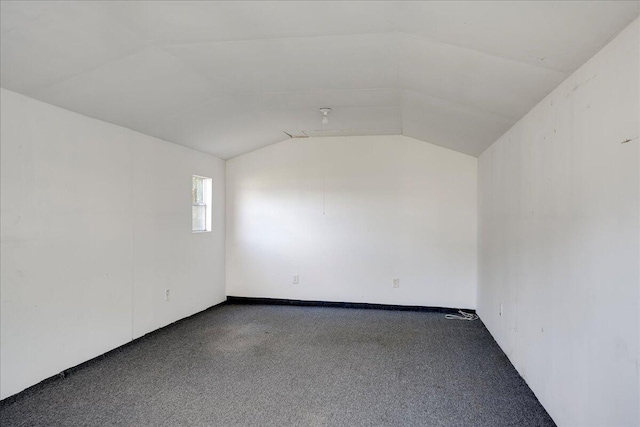 4921 Mossycup Ct, Hephzibah, GA 30815 - empty room featuring carpet floors, vaulted ceiling, and attic access