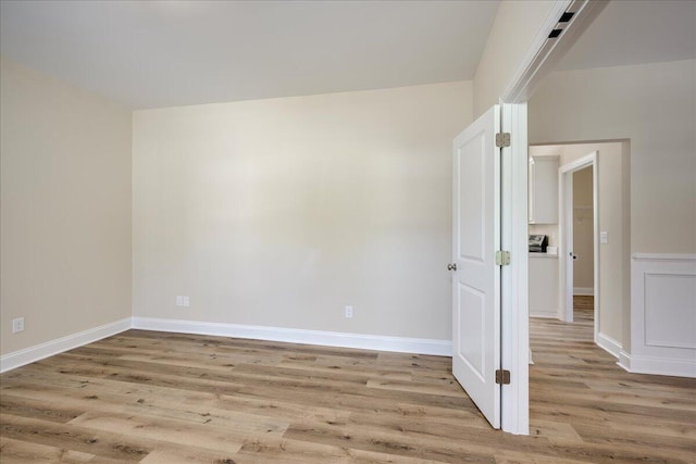 4921 Mossycup Ct, Hephzibah, GA 30815 - spare room featuring light wood-style flooring and baseboards