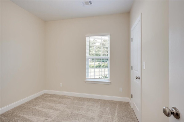 4921 Mossycup Ct, Hephzibah, GA 30815 - spare room featuring carpet floors and baseboards