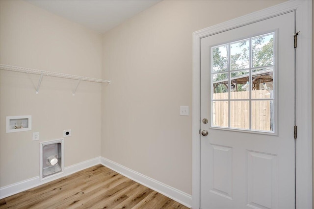 4921 Mossycup Ct, Hephzibah, GA 30815 - washroom with hookup for an electric dryer, hookup for a washing machine, and light wood-type flooring