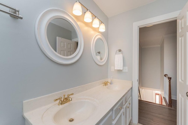 bathroom featuring double vanity and a sink