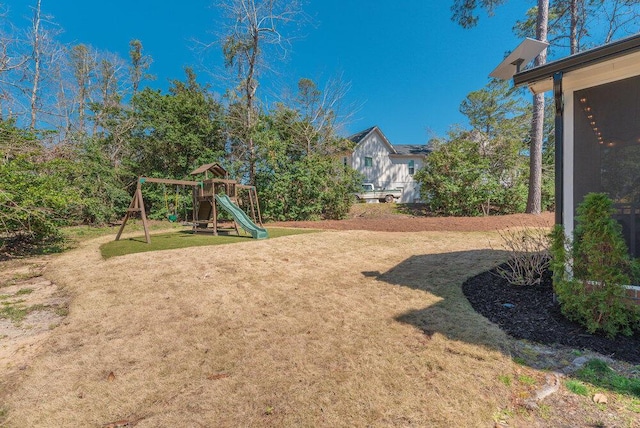 view of yard with a playground