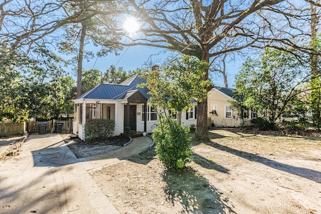 1738 Kissingbower Rd, Augusta, GA 30904 - view of front of property featuring a metal roof, a standing seam roof, and a porch