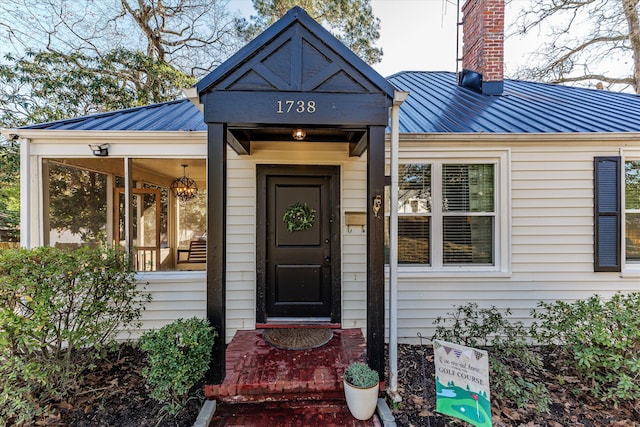 1738 Kissingbower Rd, Augusta, GA 30904 - entrance to property with a metal roof and a chimney