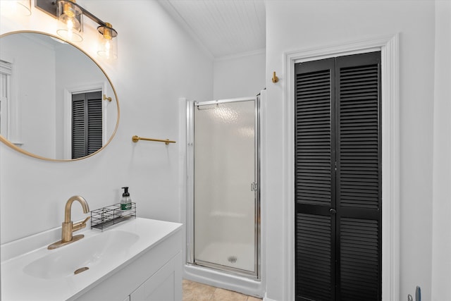 1738 Kissingbower Rd, Augusta, GA 30904 - full bath with a closet, a stall shower, vanity, tile patterned floors, and ornamental molding