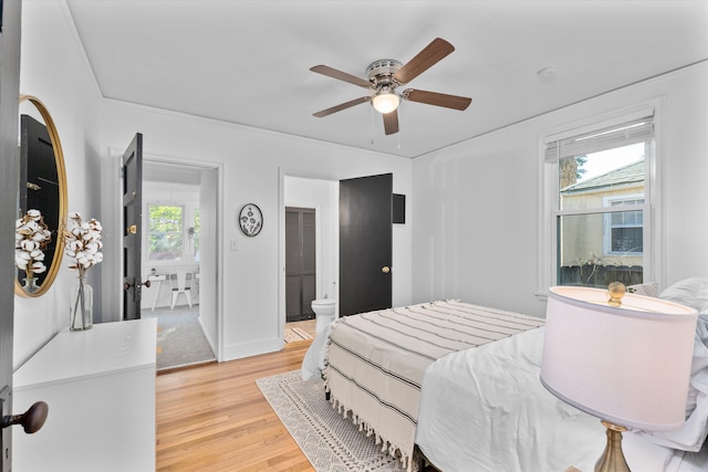 1738 Kissingbower Rd, Augusta, GA 30904 - bedroom with light wood-type flooring, ensuite bathroom, and ceiling fan