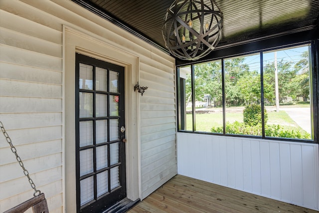 1738 Kissingbower Rd, Augusta, GA 30904 - unfurnished sunroom featuring a chandelier