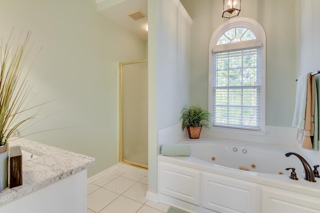 bathroom featuring a jetted tub, a stall shower, visible vents, and tile patterned floors