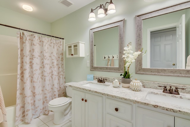 full bath with toilet, a sink, visible vents, and tile patterned floors