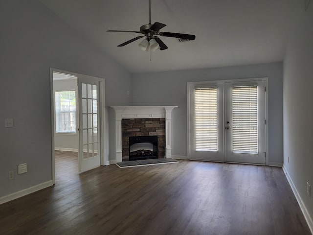 unfurnished living room featuring dark wood-style floors, ceiling fan, baseboards, french doors, and lofted ceiling