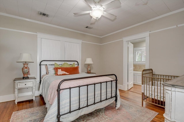 1958 Mcdowell St, Augusta, GA 30904 - bedroom featuring wood finished floors, crown molding, baseboards, and ceiling fan