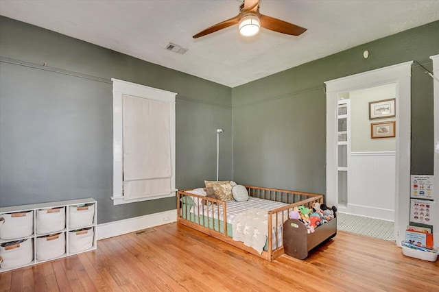 1958 Mcdowell St, Augusta, GA 30904 - bedroom featuring wood finished floors, baseboards, and a ceiling fan