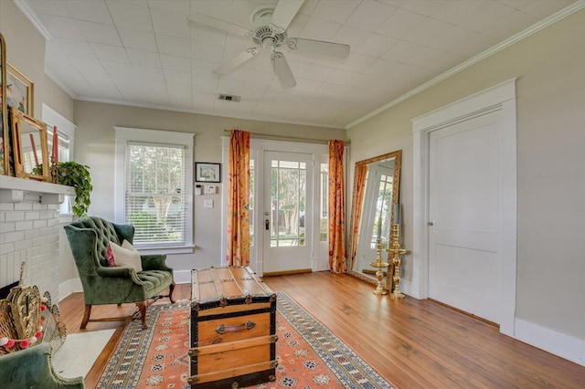 1958 Mcdowell St, Augusta, GA 30904 - foyer entrance featuring wood finished floors, a ceiling fan, and crown molding