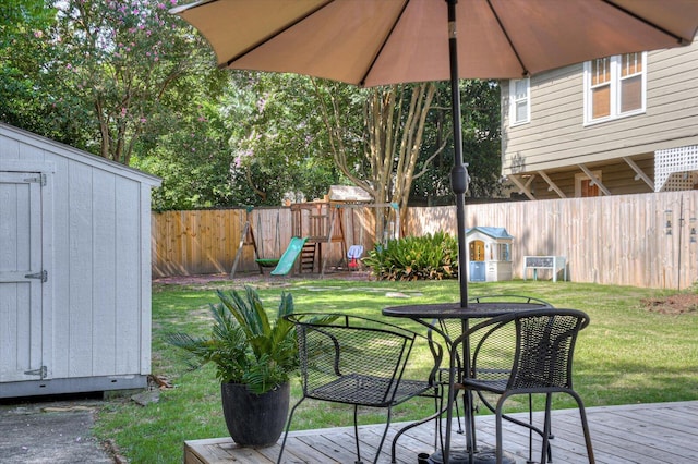 1958 Mcdowell St, Augusta, GA 30904 - view of yard with a wooden deck, outdoor dining area, and a playground