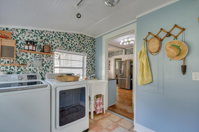 1958 Mcdowell St, Augusta, GA 30904 - laundry area featuring wallpapered walls, independent washer and dryer, crown molding, baseboards, and light tile patterned flooring