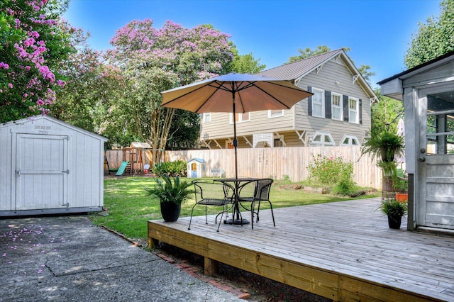 1958 Mcdowell St, Augusta, GA 30904 - wooden deck featuring a playground and outdoor dining space