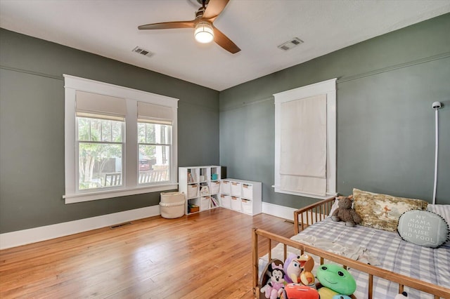 1958 Mcdowell St, Augusta, GA 30904 - bedroom with hardwood / wood-style flooring, baseboards, and a ceiling fan
