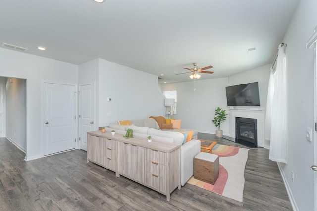 6058 Whitewater Dr, North Augusta, SC 29841 - living area with ceiling fan, dark wood finished floors, a fireplace with flush hearth, and recessed lighting