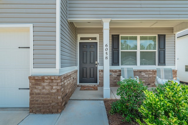 6058 Whitewater Dr, North Augusta, SC 29841 - doorway to property featuring a porch